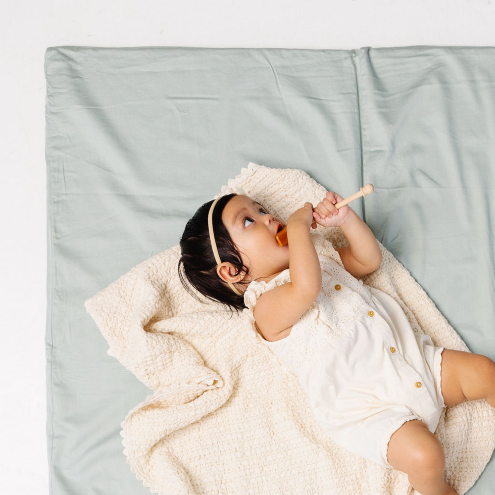 Sage + Breeze Organic Cotton Mat for babies, soft and eco-friendly play mat for safe and comfortable playtime.