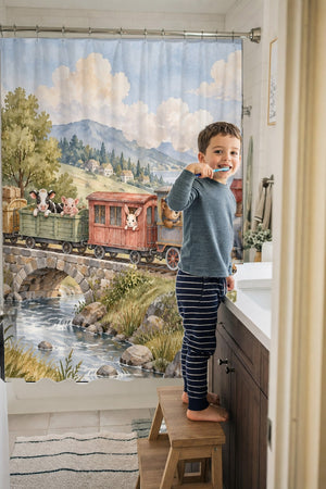 Child brushing teeth in a family bathroom with the Countryside Train shower curtain