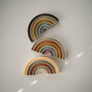 Colorful Rainbow Stacker Toy for babies, showcasing vibrant rings in a playful design. Perfect for early learning and fun!
