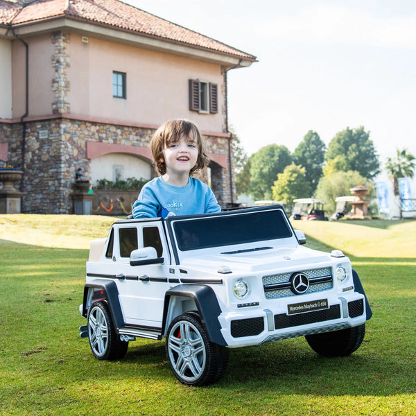 12V Mercedes Maybach G650 Landaulet ride-on car for kids, angle view showcasing sleek design and features.