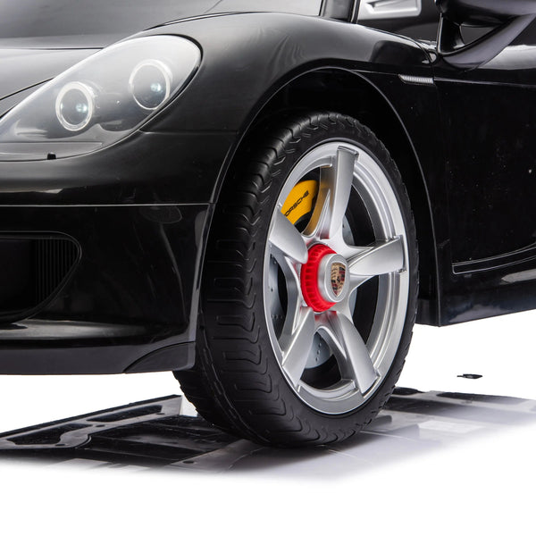 12V Porsche Carrera GT ride-on car for kids, angled view showcasing sleek design and vibrant colors.