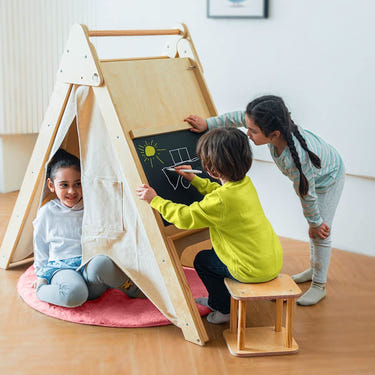 Oak wood learning tent and climber set with desk and chair for indoor play and exploration.