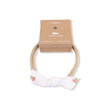 Petite Pointe Fleur bow with nylon headband for babies, stylish and comfortable accessory for infants.