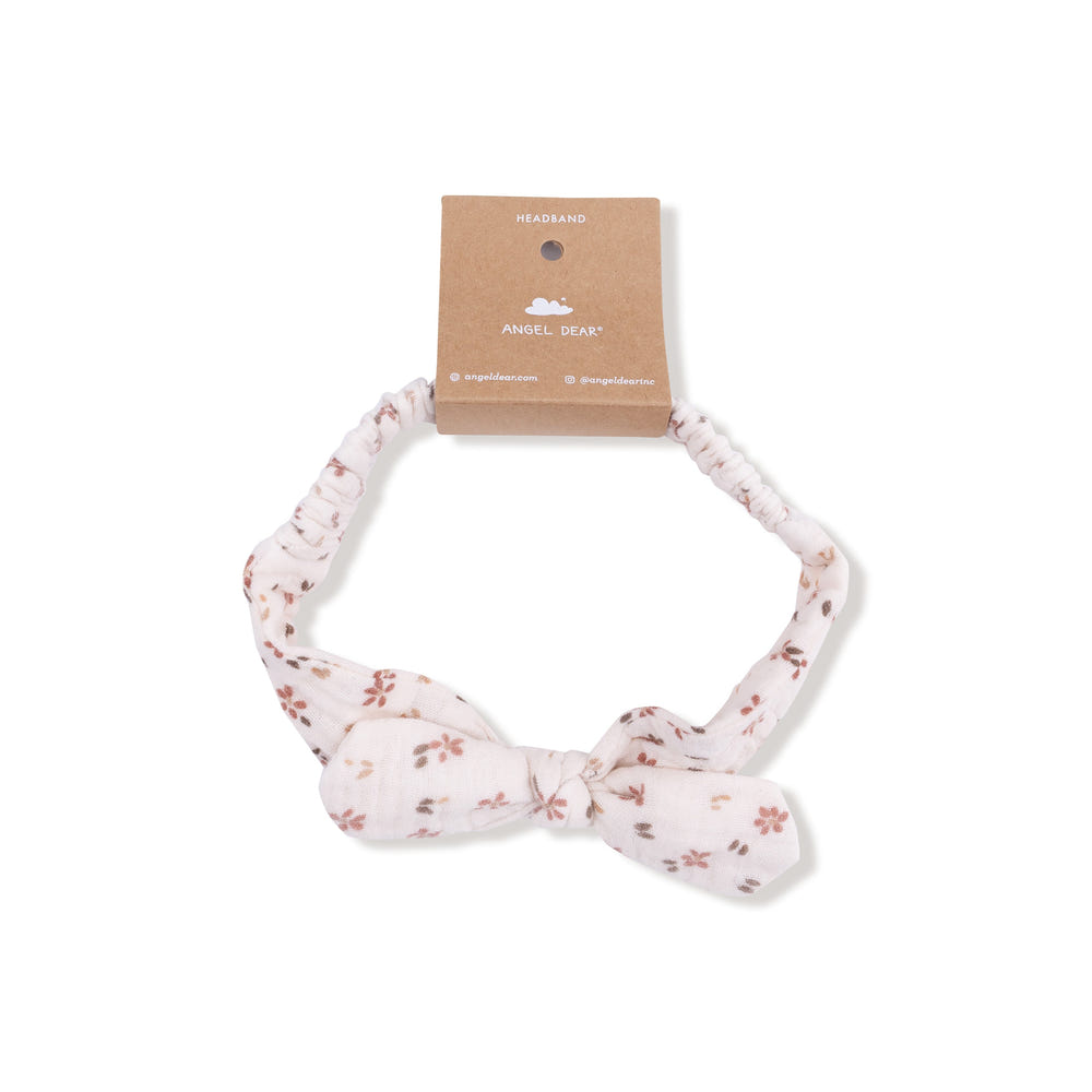 Carrie Floral Knot Headband for babies, stylish and comfortable accessory for hats, socks, and mittens collection.