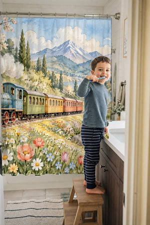 Child brushing teeth in a family bathroom with the Flower Meadow Train shower curtain