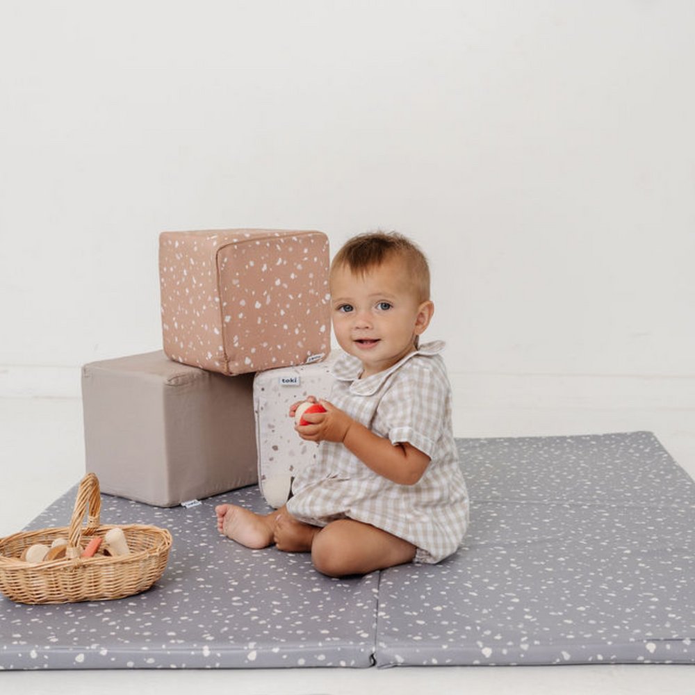 Terrazzo Clay Play Cube for babies, featuring a colorful design for interactive play and development.
