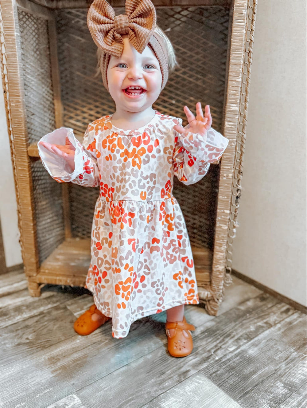Fall Leopard bell sleeve dress for babies, featuring a stylish design perfect for autumn outings.