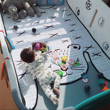 Baby play mat featuring a cute white tiger design, perfect for playtime and tummy time.