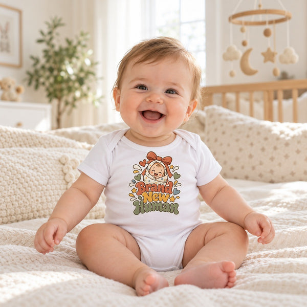 Baby wearing the Brand New Human baby bodysuit