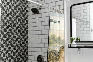 A is for Alligator Alphabet shower curtain in a modern farmhouse bathroom with subway tile