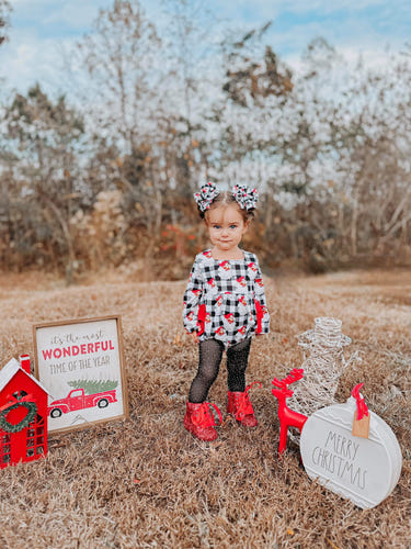 Checkered Santa ruffle romper for babies, perfect festive outfit for holiday celebrations.