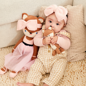Cute Baby Fox knit doll in a cozy pose, showcasing soft textures and vibrant colors from angle 2. Perfect for little ones!