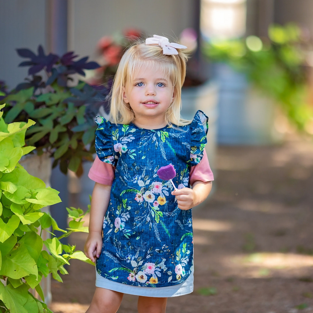Boho Floral Flutter Bapron for babies, featuring a stylish floral design and flutter sleeves, perfect for mealtime.