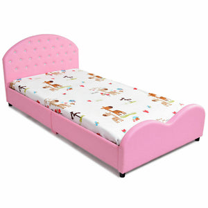 Twin size upholstered toddler bed with wood slat support, perfect for stylish and comfortable sleep.