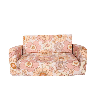 "Blooms Play Couch in vibrant colors, perfect for imaginative play and cozy lounging for babies and toddlers."