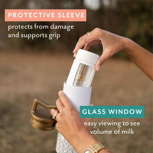 Set of 2 glass breast milk bottles, angled view, perfect for safe breast milk storage.