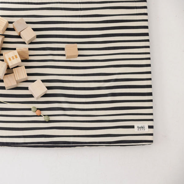 Bold Stripe Organic Cotton Mat for babies, featuring vibrant colors and soft texture, perfect for playtime and comfort.