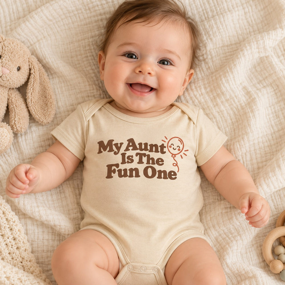 Baby wearing the Auntie's Little Bestie baby bodysuit