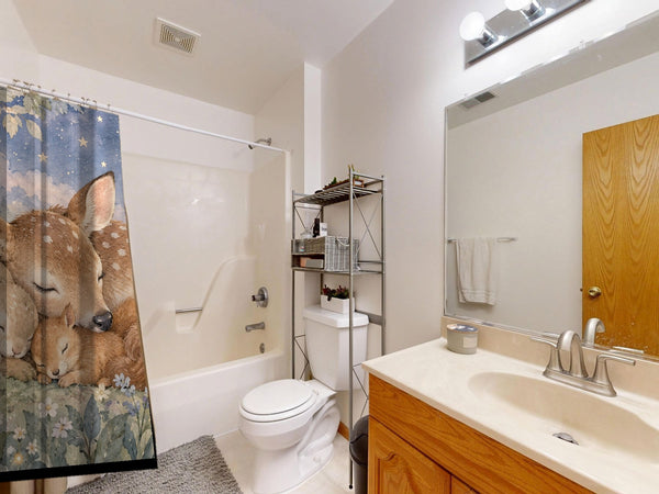 Woodland Friends shower curtain on a tub shower combo in an American family bathroom