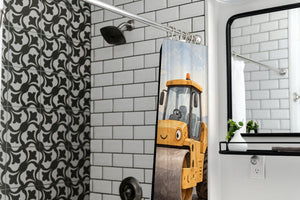 Road Roller shower curtain in a modern farmhouse bathroom with subway tile