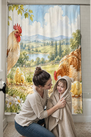 Mom drying her toddler in a hooded towel in front of the Chicks Field Farm shower curtain