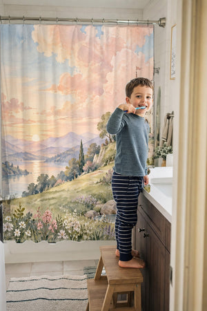 Child brushing teeth in a family bathroom with the Hilltop Castle Fairy Tale shower curtain