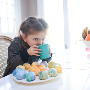 Colorful 8oz stackable silicone cups for kids and toddlers, 4-pack, shown from angle 5. Perfect for mealtime fun!