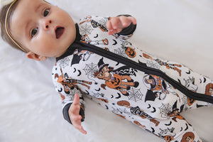 Howdy Boo Zippy zip pajamas for babies, featuring a cozy design and playful patterns, shown from angle 7.