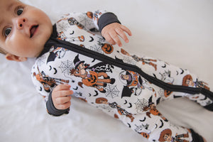 Howdy Boo Zippy zip pajamas for babies, featuring a cozy design and playful colors, angle view 10.