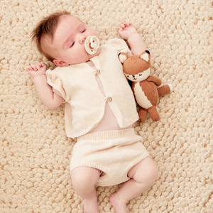 Knit baby fox doll in angle 6, perfect for cuddles and playtime. Adorable and soft for your little one.