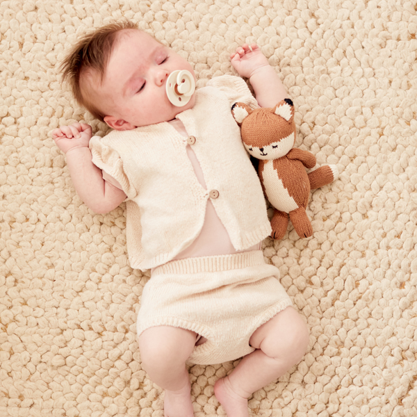 Knit baby fox doll in angle 6, perfect for cuddles and playtime. Adorable and soft for your little one.