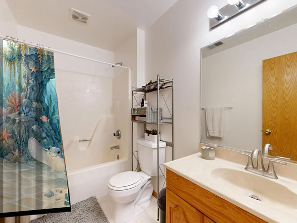 Treasure Cove Ocean shower curtain on a tub shower combo in an American family bathroom