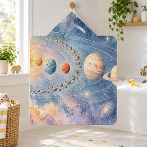 Pastel Planets kids hooded bath towel hanging in a kids bathroom
