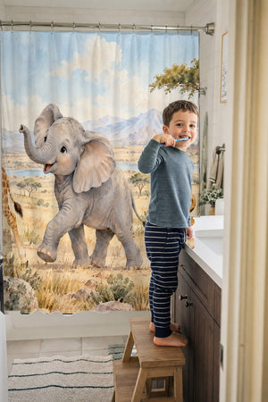 Child brushing teeth in a family bathroom with the Safari Parade shower curtain
