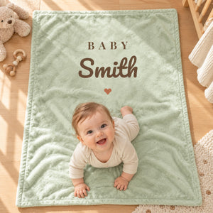 Baby Surname minky baby blanket in sage, styled photo 2