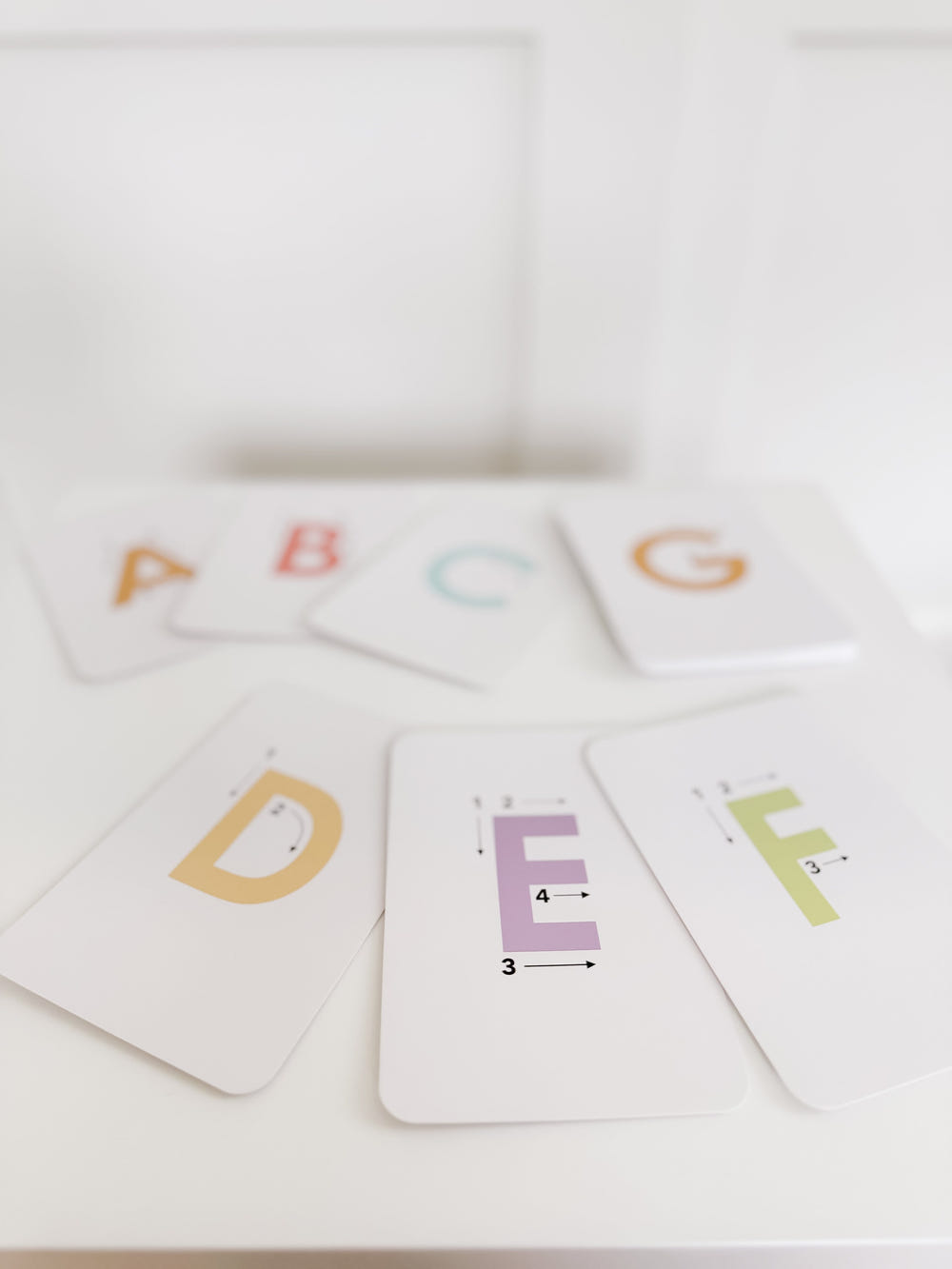 "Letter tracing flashcards for babies, promoting early literacy and fine motor skills in a safe learning environment."