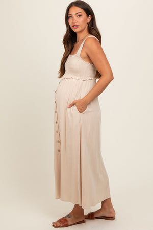 Beige button-down smocked maternity dress, stylish and comfortable for expecting mothers, shown from angle 3.