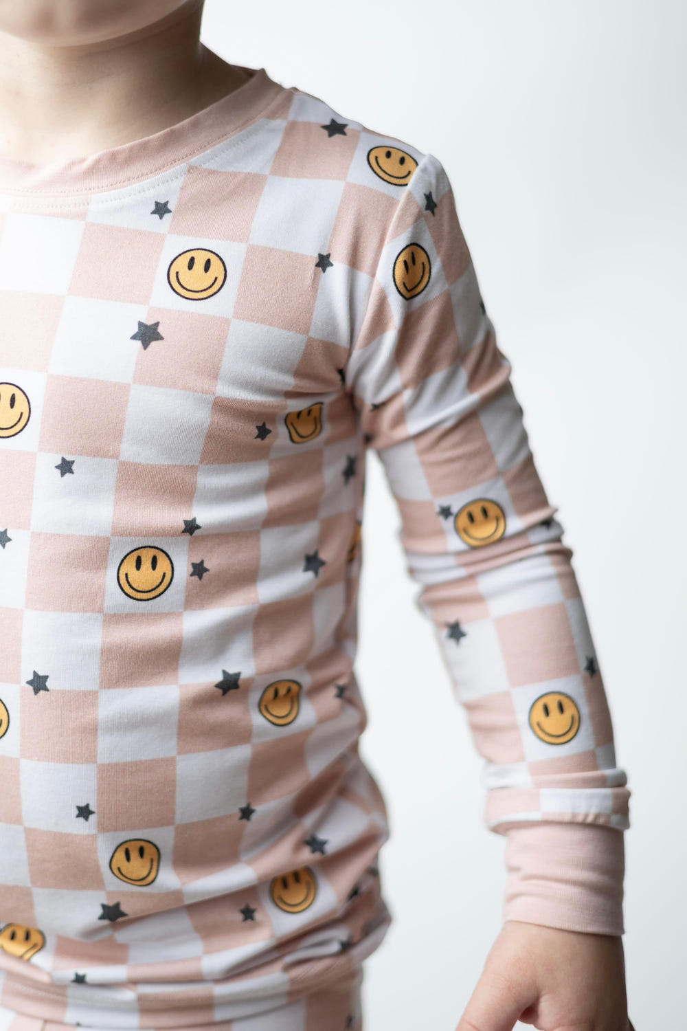 Checked Out Set sleepsuits and pyjamas for babies, featuring a stylish checked design.