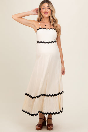Beige colorblock trim maternity midi dress, stylish and comfortable for expecting mothers. Angle 3 view.