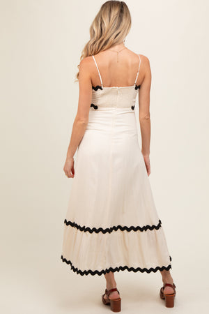 Beige colorblock trim maternity midi dress displayed at angle 5, perfect for stylish expectant mothers.