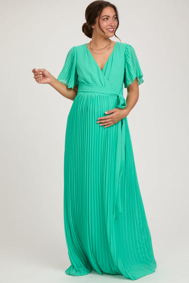 Aqua chiffon maternity maxi dress with pleated design and V-neck, perfect for stylish comfort during pregnancy.