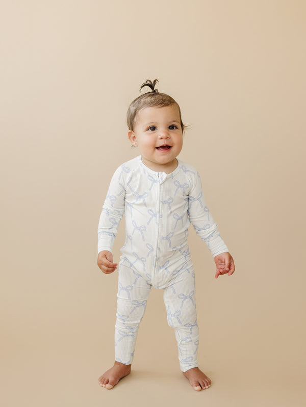 Blue Belle Ribbed Bamboo Zippy Pajamas for babies, featuring a soft, breathable fabric in a stylish design.