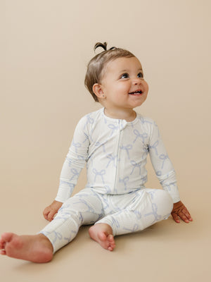 Blue Belle Ribbed Bamboo Zippy Pajamas for babies, featuring a cozy design in a soft blue color.