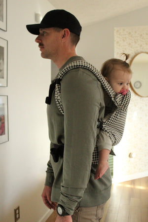 Coco Houndstooth woven jacquard baby carrier for 7-35 lbs, shown at angle 6, stylish and comfortable for parents.