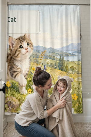 Mom drying her toddler in a hooded towel in front of the C is for Cat Alphabet shower curtain