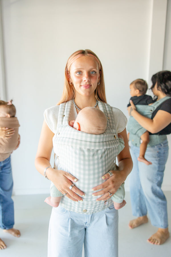 Monroe x Coco Gingham Cotton Baby Carrier for infants 7-35 lbs, shown from angle 7. Stylish and comfortable support.