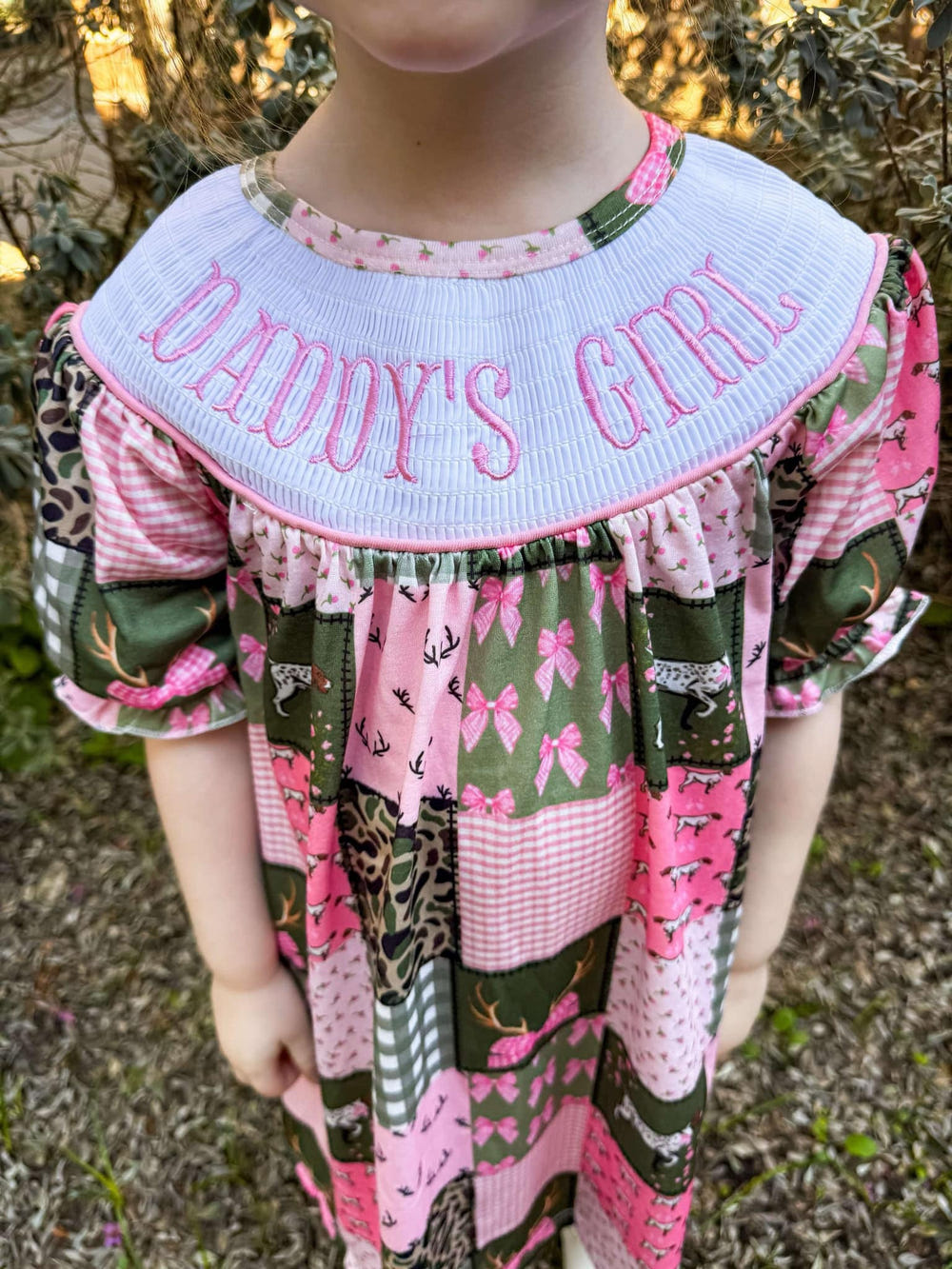 Smocked hunting daddy's girl dress for babies, perfect for stylish and playful outings.