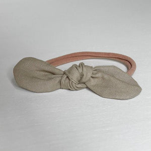 Knotted Hair Bow in Earth tones, perfect for babies, enhancing style in toys and entertainment.