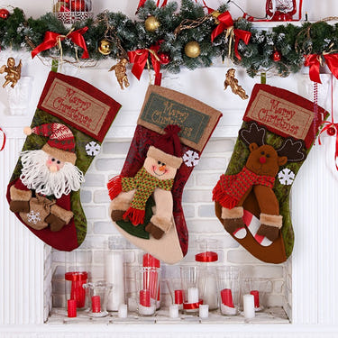 "Christmas stocking featuring Santa and snowman decor, perfect for festive baby celebrations."