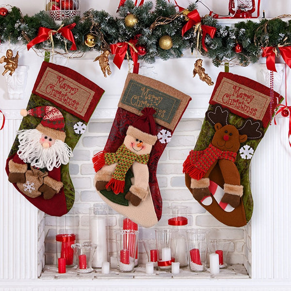 "Christmas stocking featuring Santa and snowman decor, perfect for festive baby celebrations."